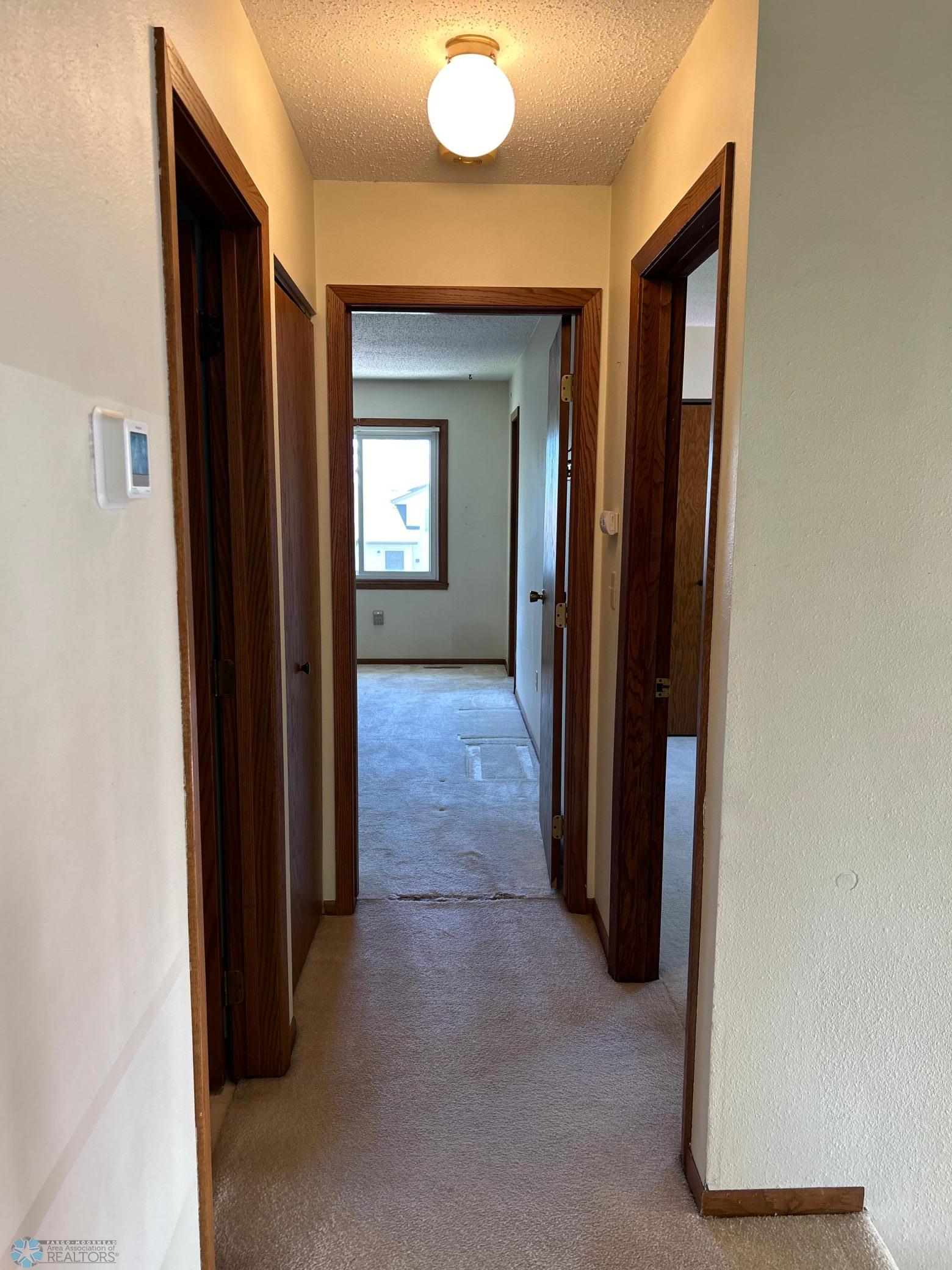 hallway to bedrooms and bath