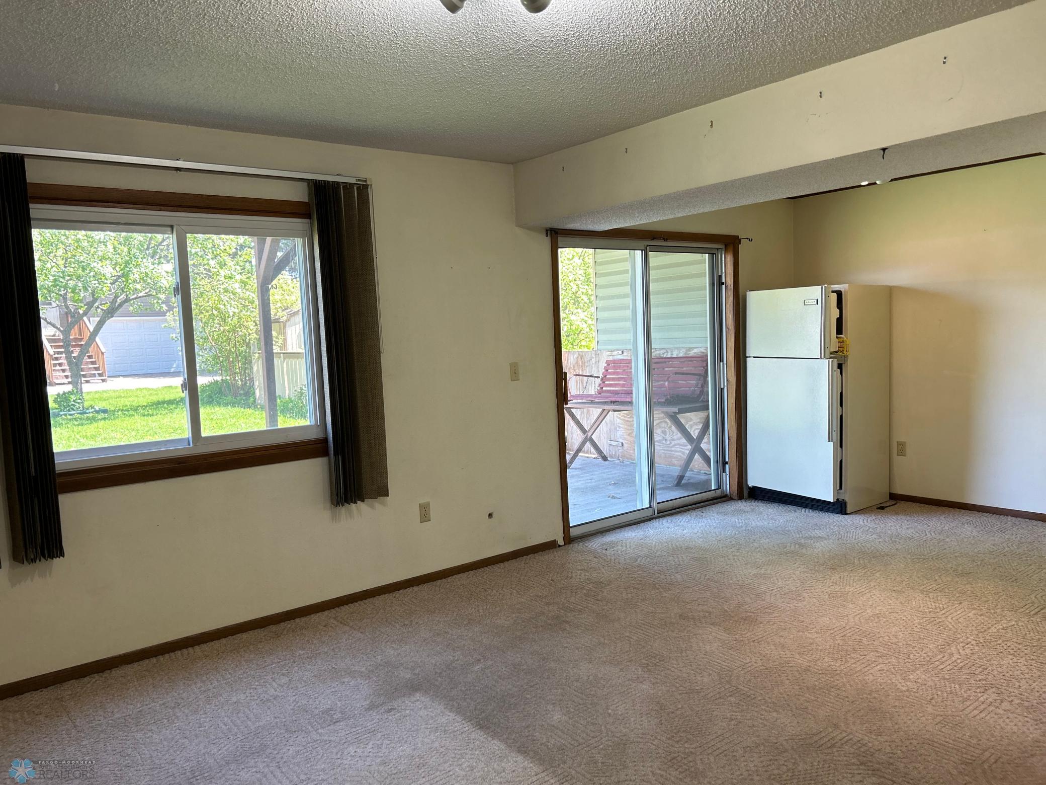 family room with walk out to patio
