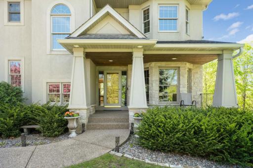 A beautiful covered front porch welcomes you home.
