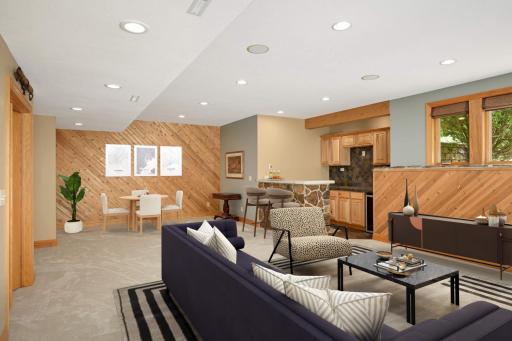 A wet bar and gaming area complete this fantastic space.