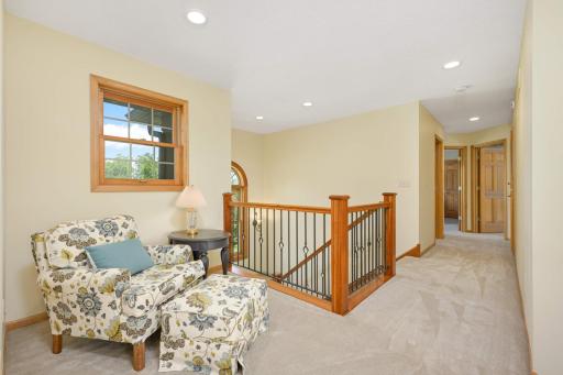 The cozy landing welcomes you to the private living spaces.