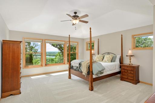 Awake to stunning views from the gorgeous primary suite.