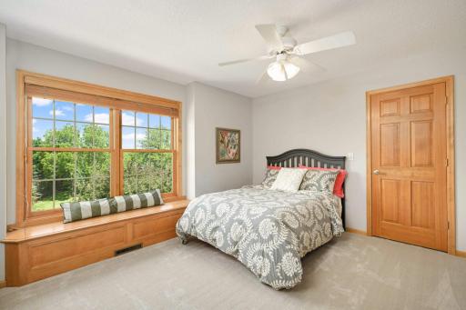 The third upper level bedroom has a secret! The closet in this room has access to the massive, unfinished space above the four car garage! Currently concealed by drywall but framed during construction.