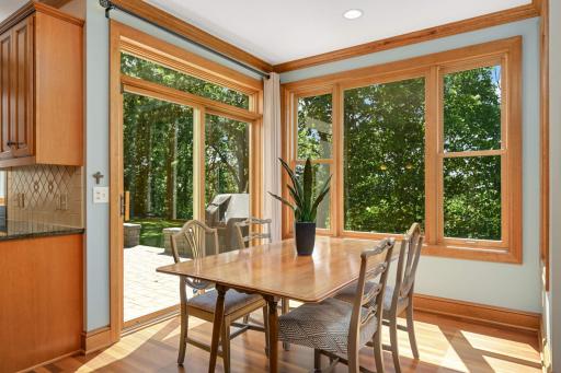 The informal dining area gives way to the amazing outdoor patio.