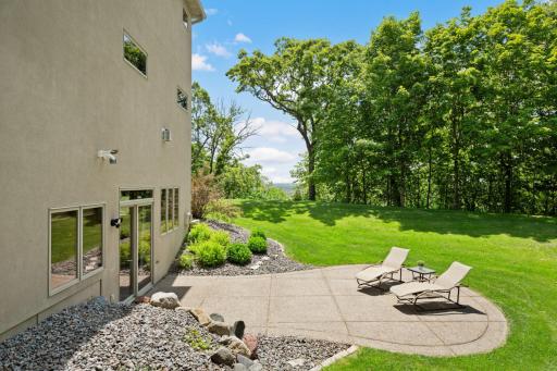 A generously sized patio is just outside the lower level amusement room.