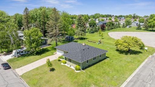 Situated on a corner lot - this property boasts plenty of yard space, updated landscaping and brand new concrete patio in backyard!