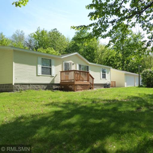 Welcome to this Country Home featuring 3 bedrooms and 2 baths situated on a beautifully wooded 17+ acres with a pond!