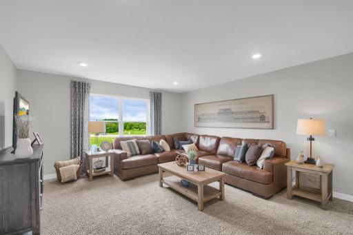 The upper level loft is a great space to unwind, read books or watch TV. Model photos. Options and colors will vary.