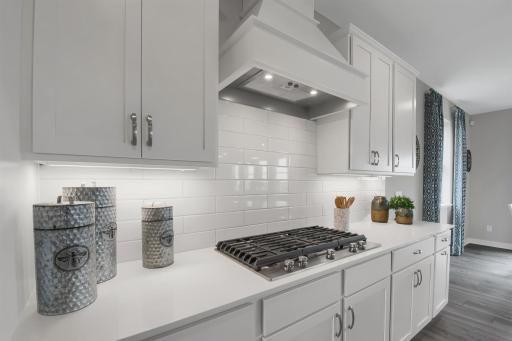 Plenty of space to prepare and cook! This kitchen is a dream come true! Model photos. Options and colors will vary.