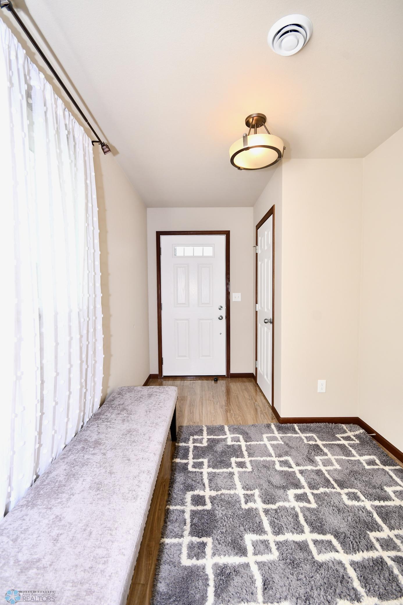 Front Foyer with Sitting Area and Large Coat Closet