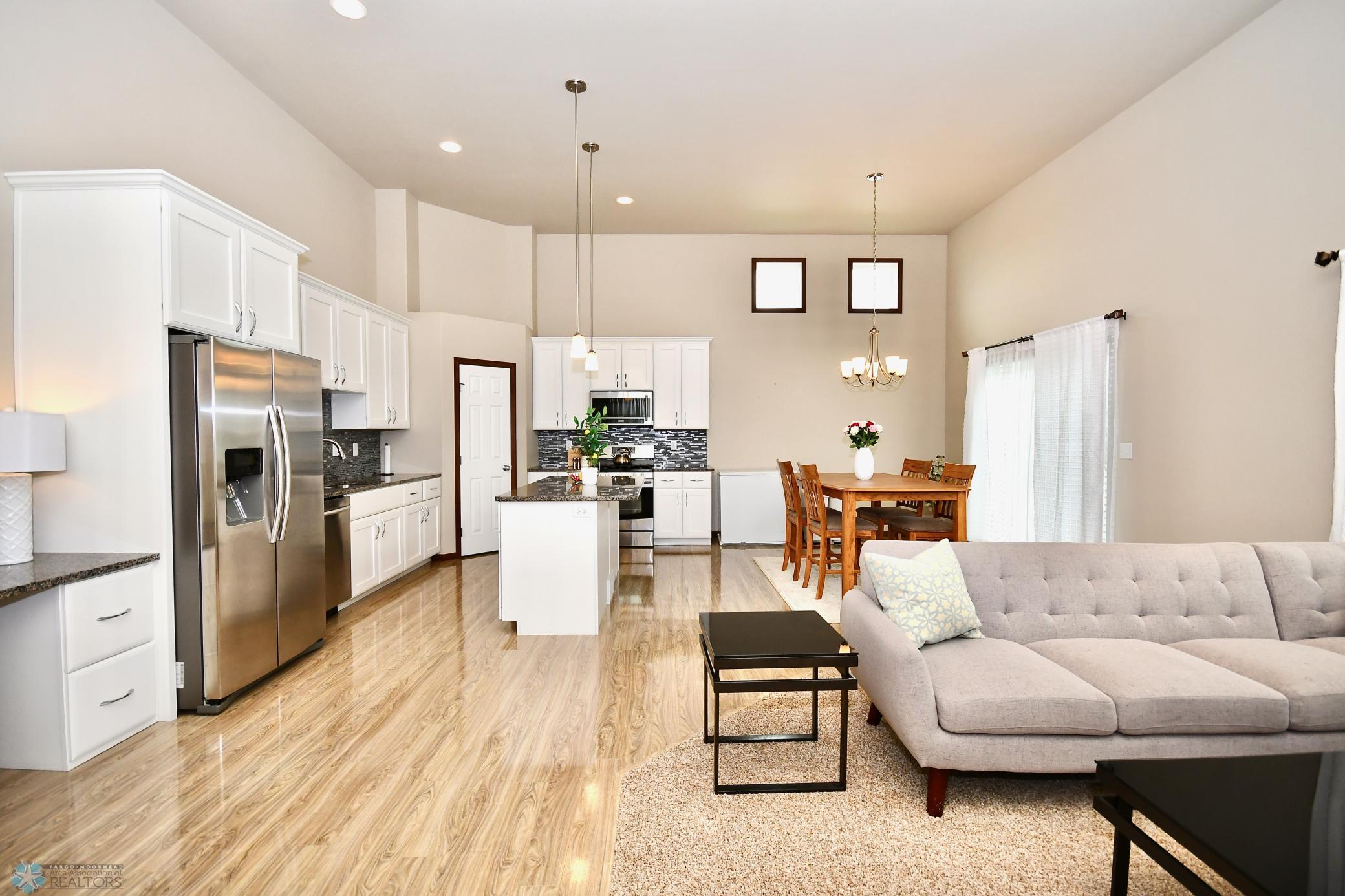 Kitchen/Dining - Deck Nook; SS Appliances; Corner Pantry; Gas Range; Large Kitchen Island with Granite Countertops