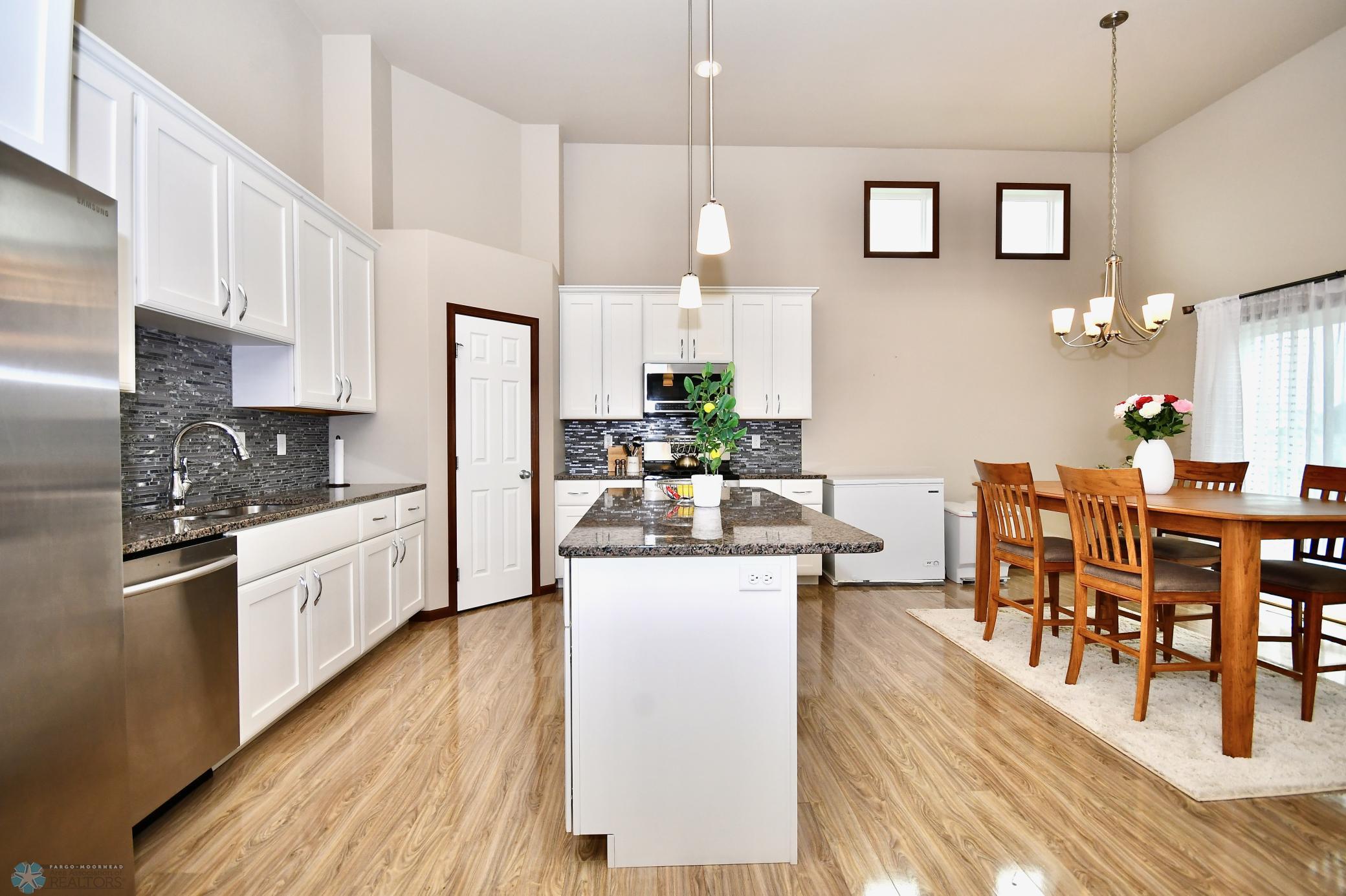Lots of Cabinet Space; Backsplash Surround