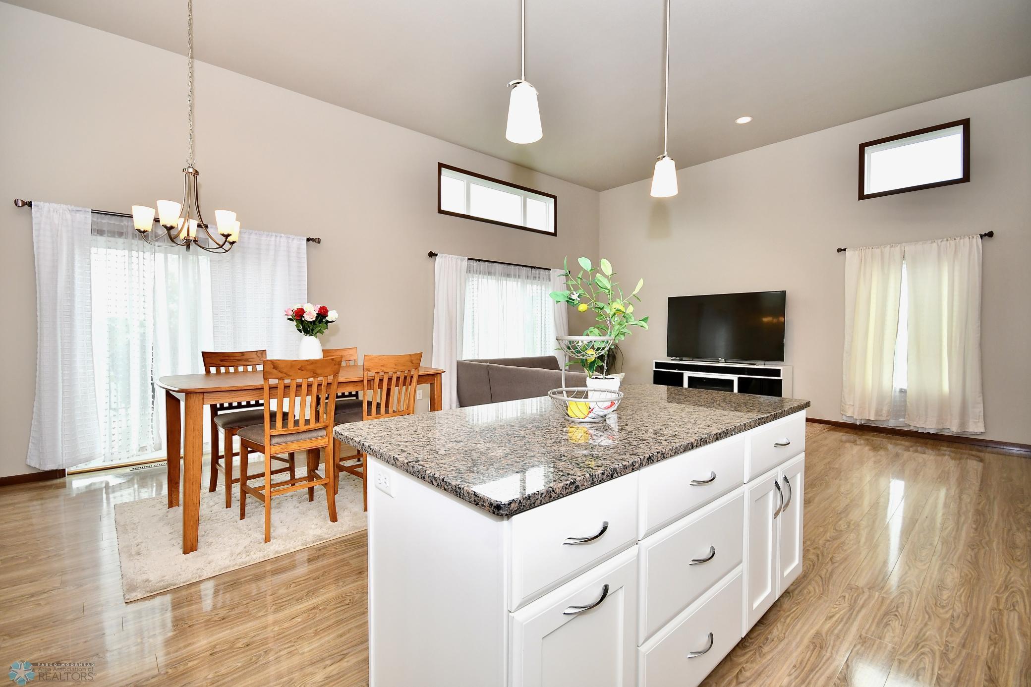 Kitchen/Dining/Living Room with Patio Access to Deck