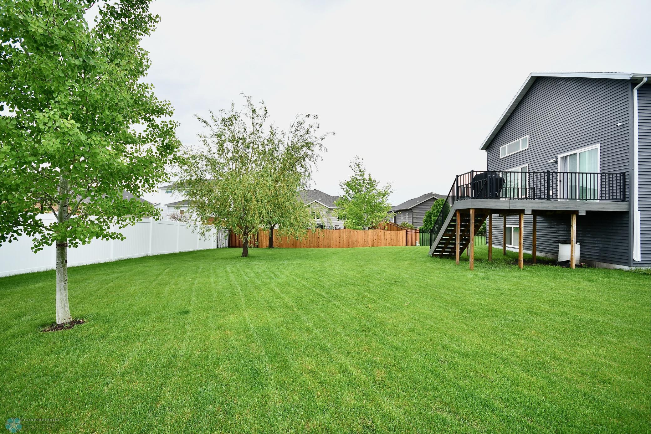 Well-manicured lawn with sprinkler system