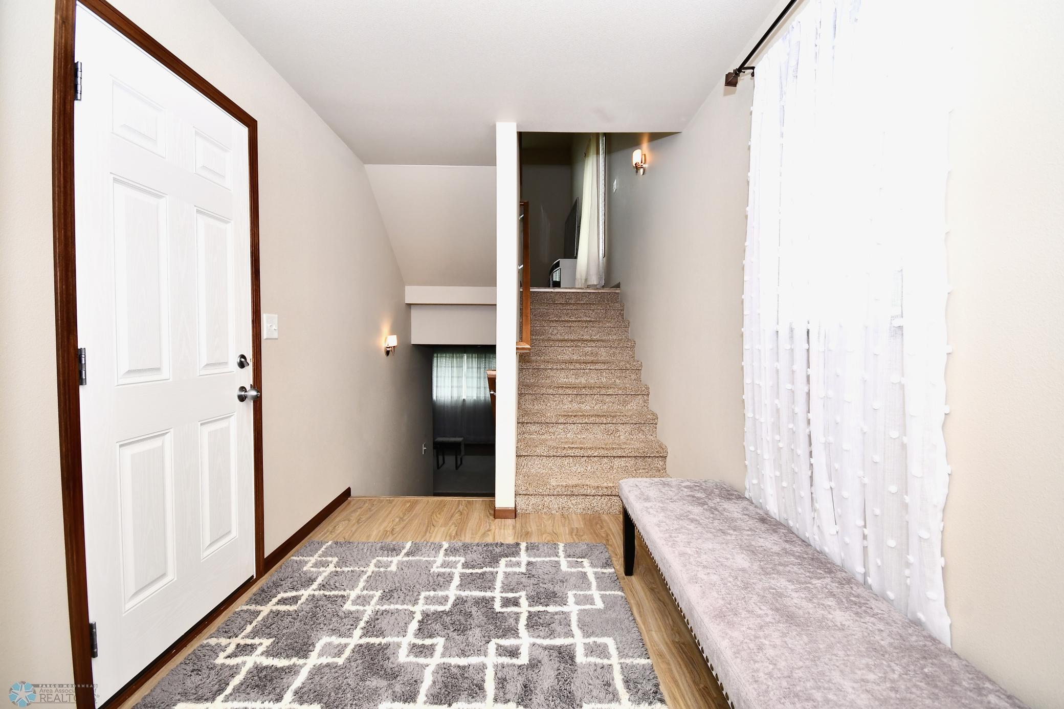 Large Open Front Entry; Service Door/Entry to Garage