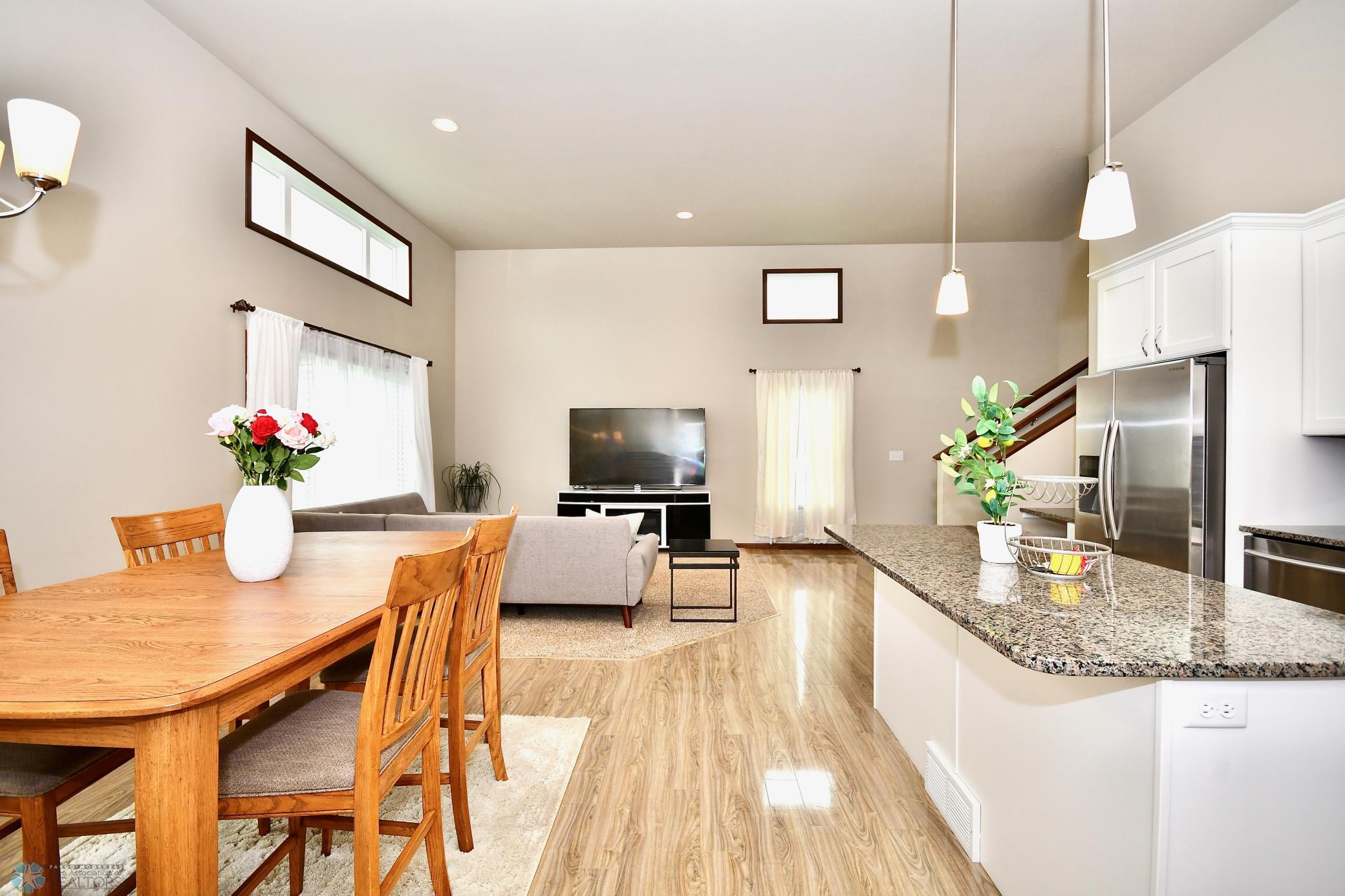Dining Area with Large Kitchen Island for plenty of seating!!