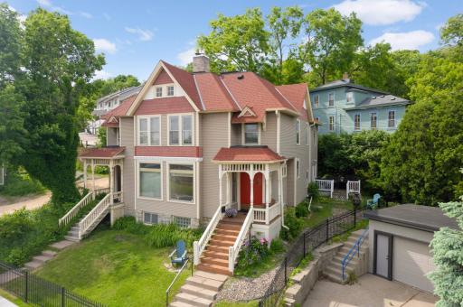 This stunning 1892 Victorian twin home is a must-see, seamlessly integrating the charm of the past with the convenience of modern living.