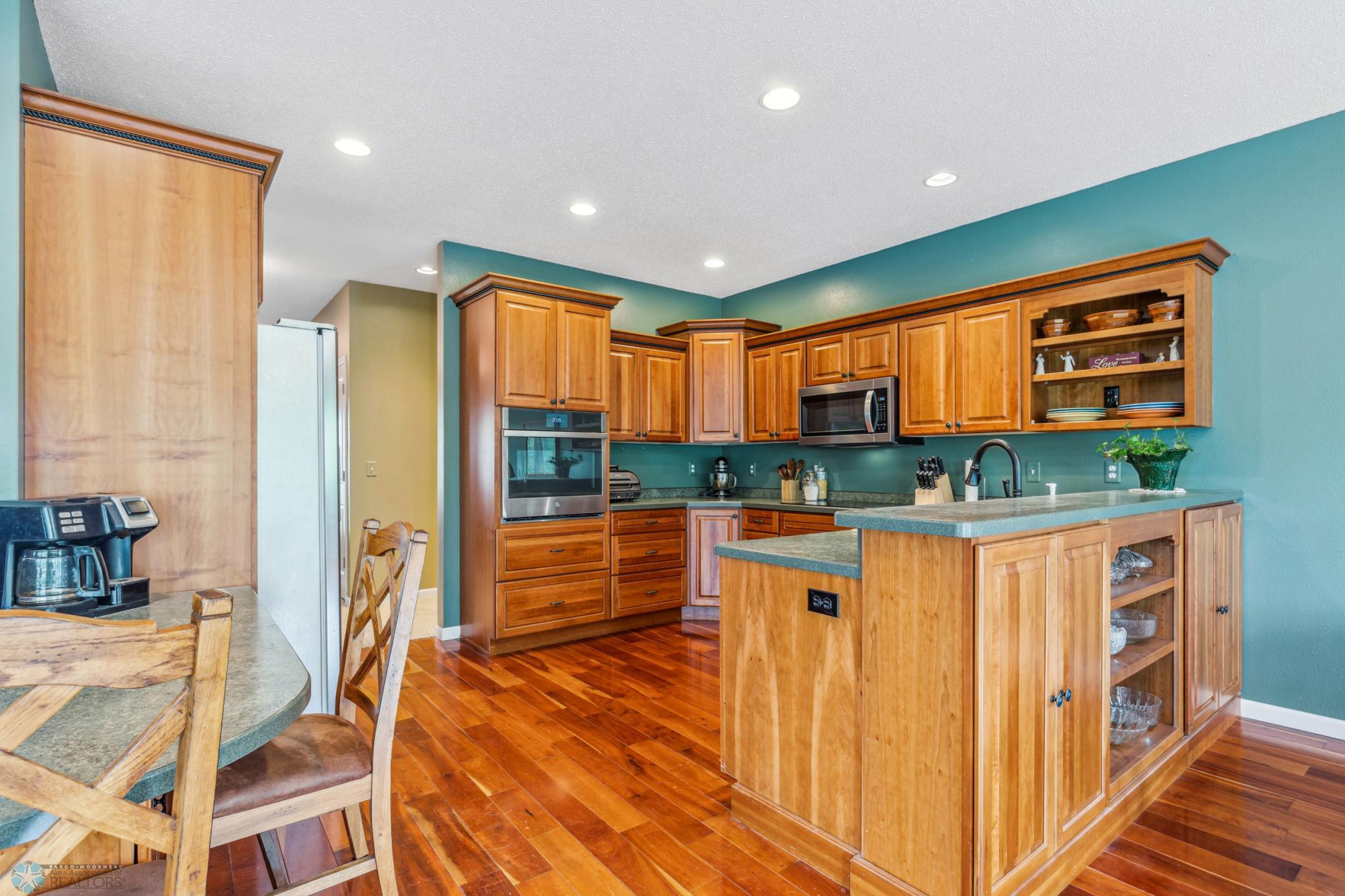 Kitchen with Cherry hardwood floors