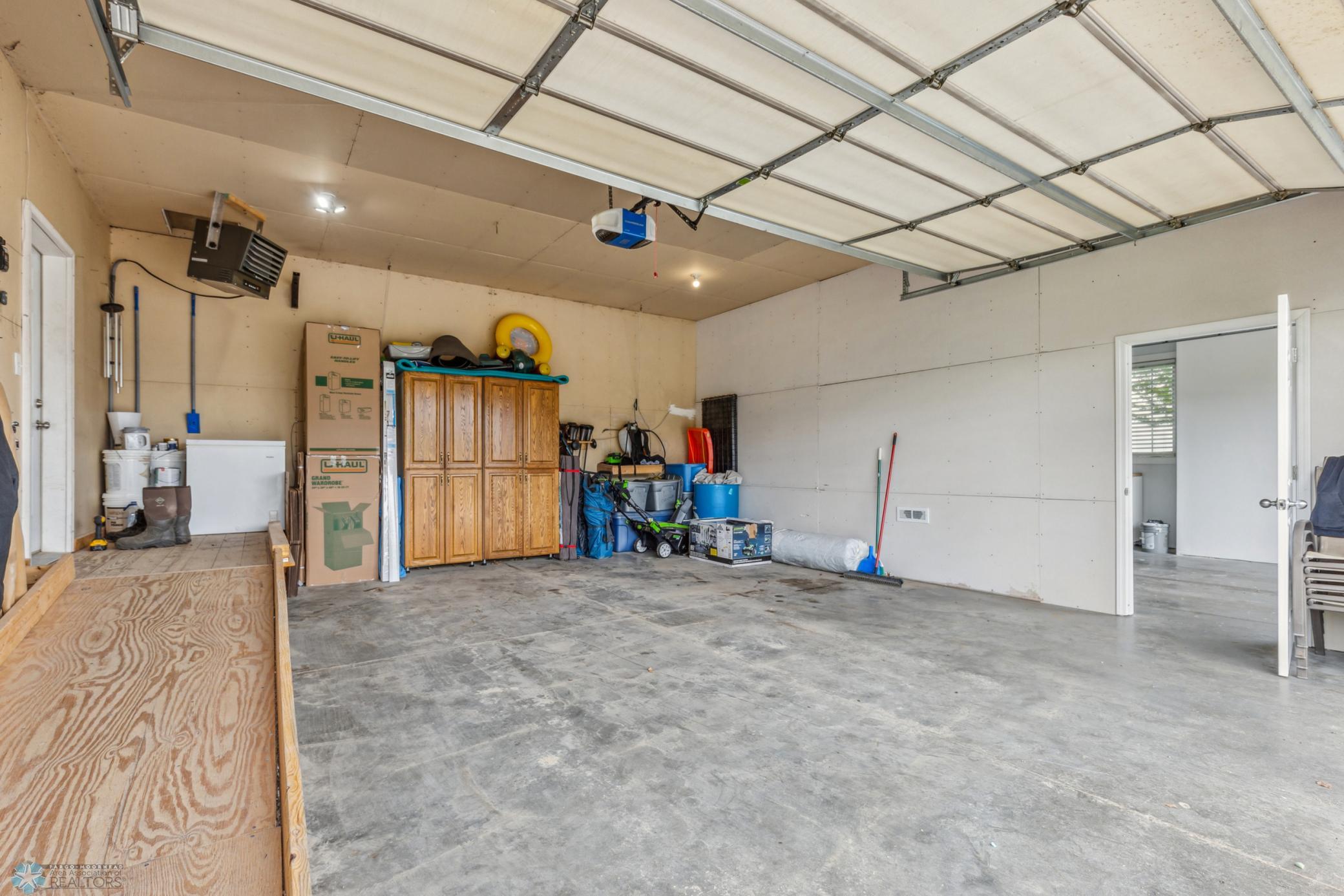 Double-stall garage side interior - separating wall is not load bearing.
