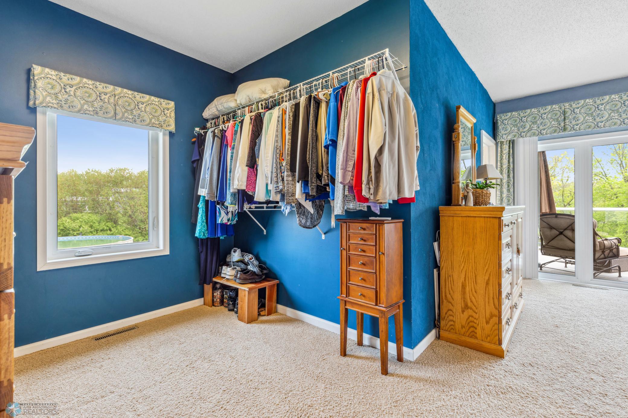 Primary Bedroom closet (additional storage in cabinetry to right (not pictured).