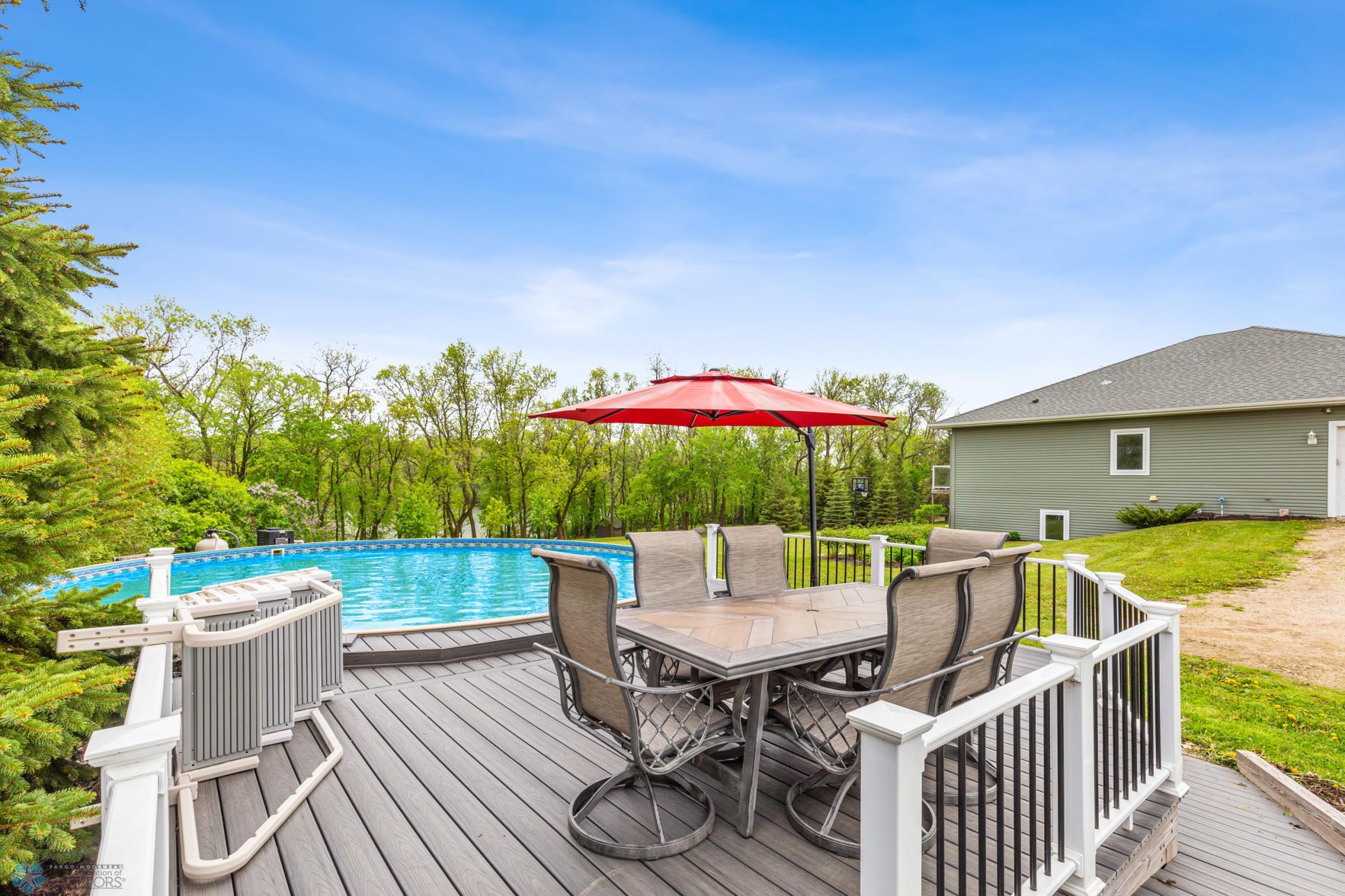 Pool patio - heated above-ground pool included!