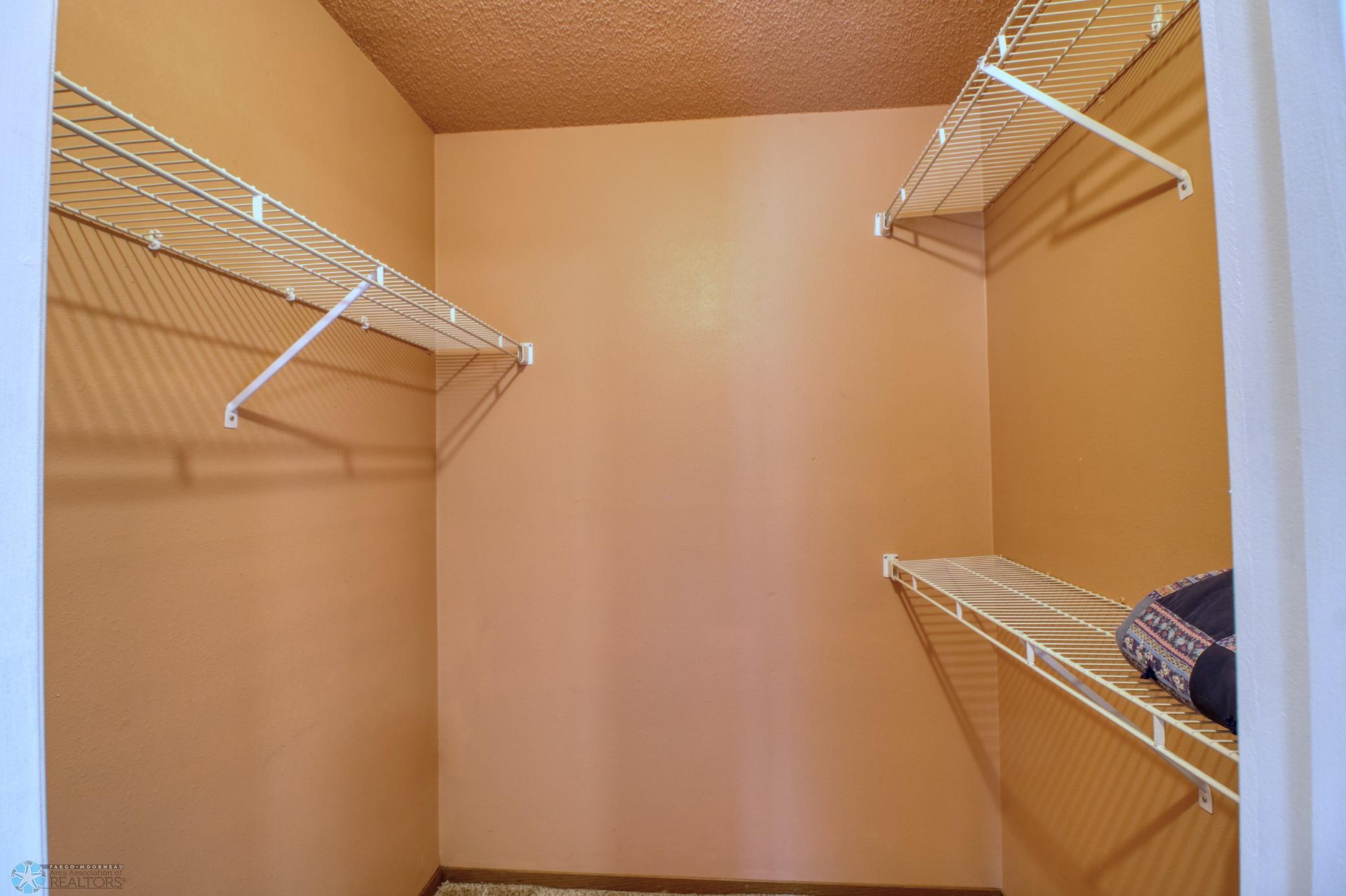 Upper bedroom 1 walk in closet
