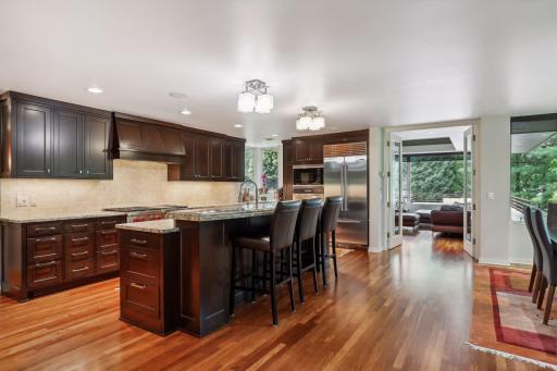 Kitchen features high-end appliances and granite countertops