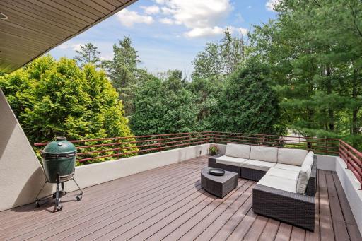 Deck is located off of the sitting room and has plenty of space to entertain family and guests