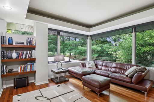 An incredible and inviting sitting room located off the back of the kitchen