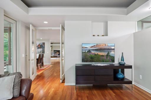Sitting room looking out toward kitchen and dining area