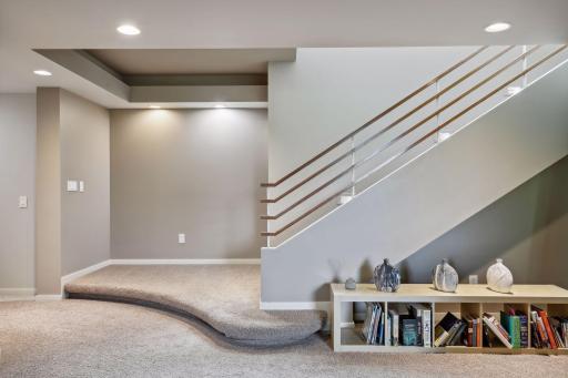Staircase leading down to lower level Family Room