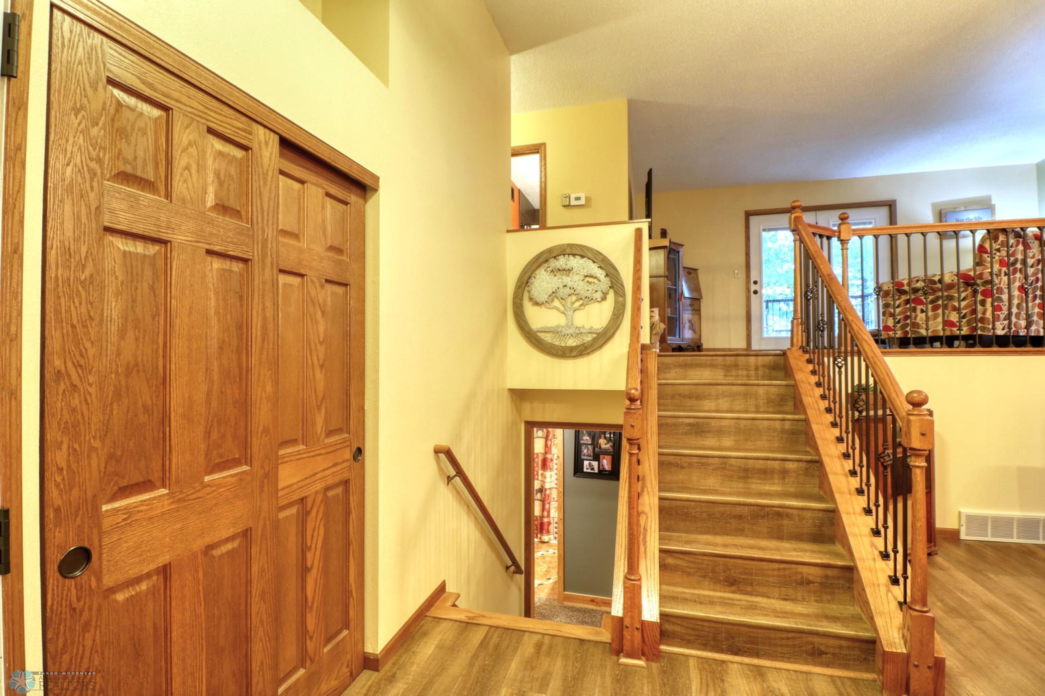 Stairway from Kitchen/Dining to Upper Level.jpg