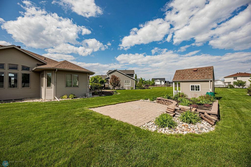 Brick Patio Area in Back Yard