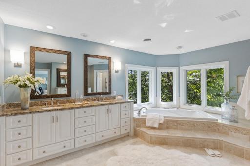 Spacious primary bath filled with natural light