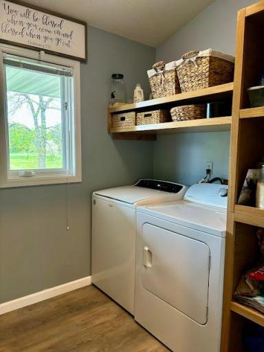 Main floor convenient laundry room with amble storage.