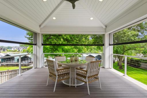 Convenient phantom screens turn this fabulous space into a screened porch