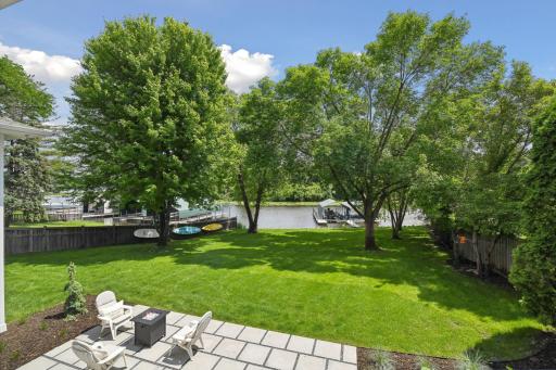 Gorgeous level lakeside yard is perfect for yard games
