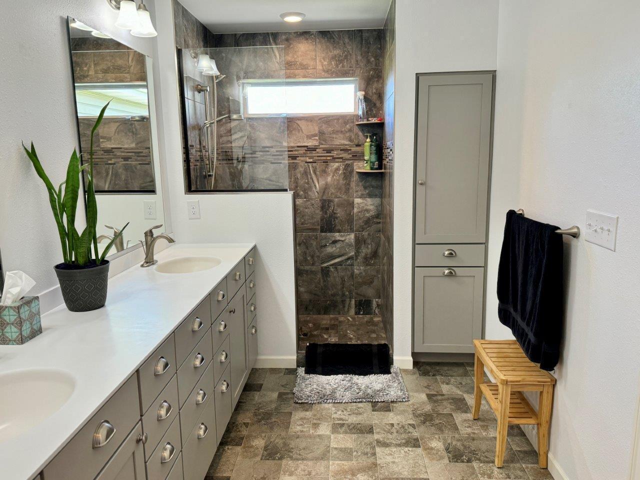 14-Primary bathroom with tile shower (2).jpg