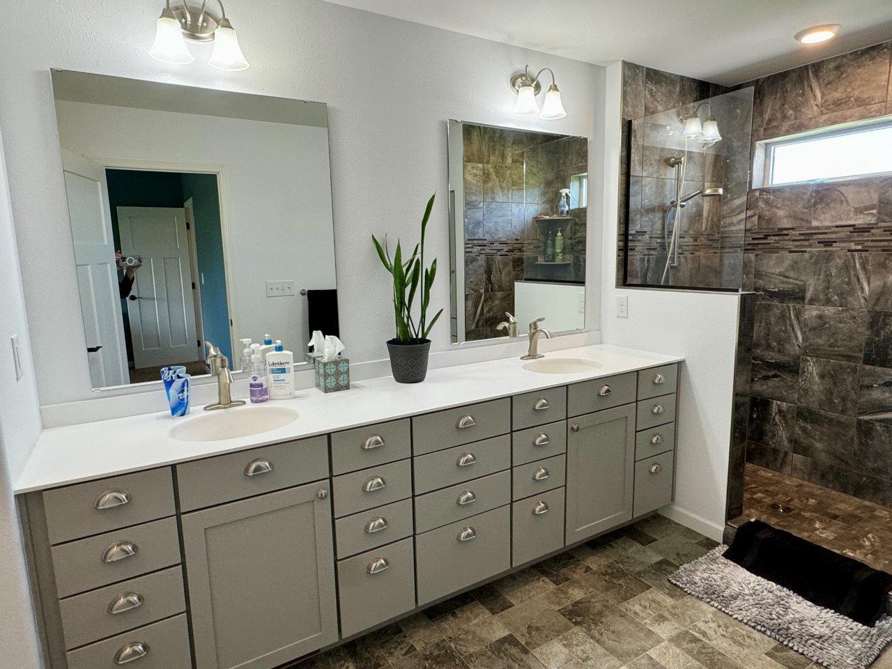 14-Primary bathroom with tile shower (1).jpg