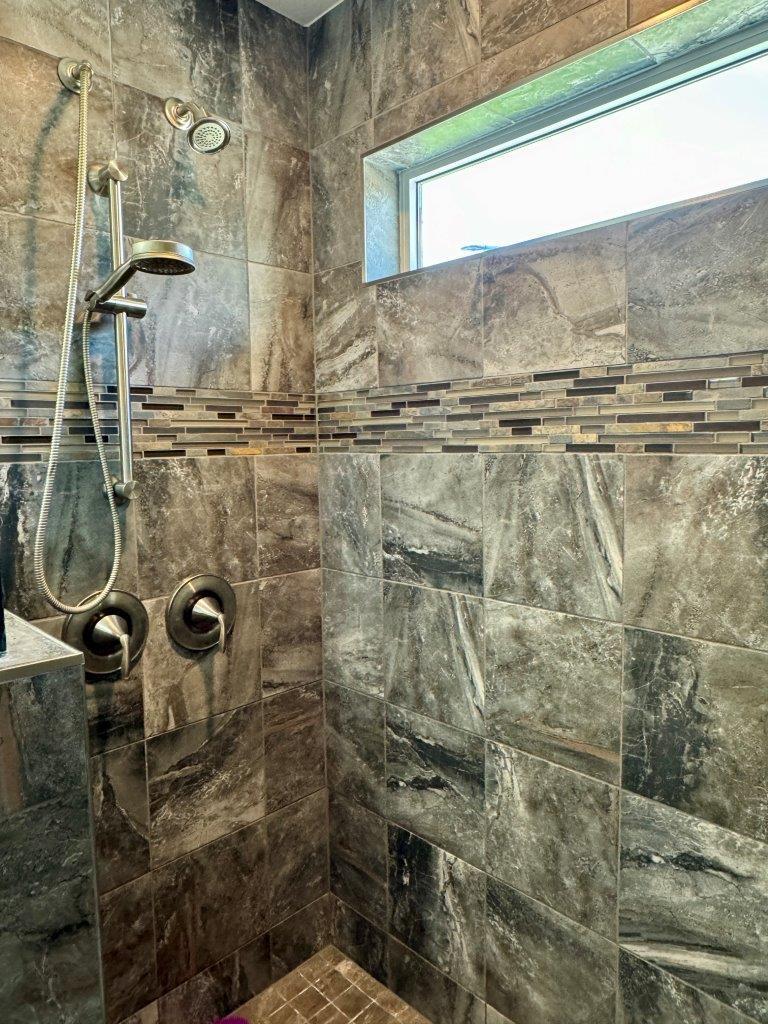 14-Primary bathroom with tile shower (3).jpg