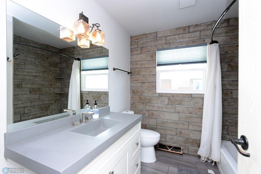 Updated bathroom with tile shower