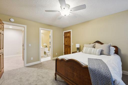 Upper level bedroom with ensuite bathroom and walk-in closet
