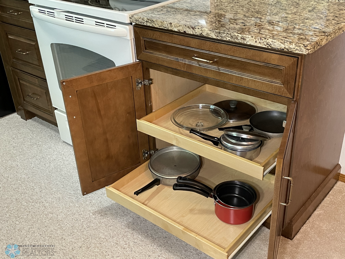 Kitchen cabinet pull-outs