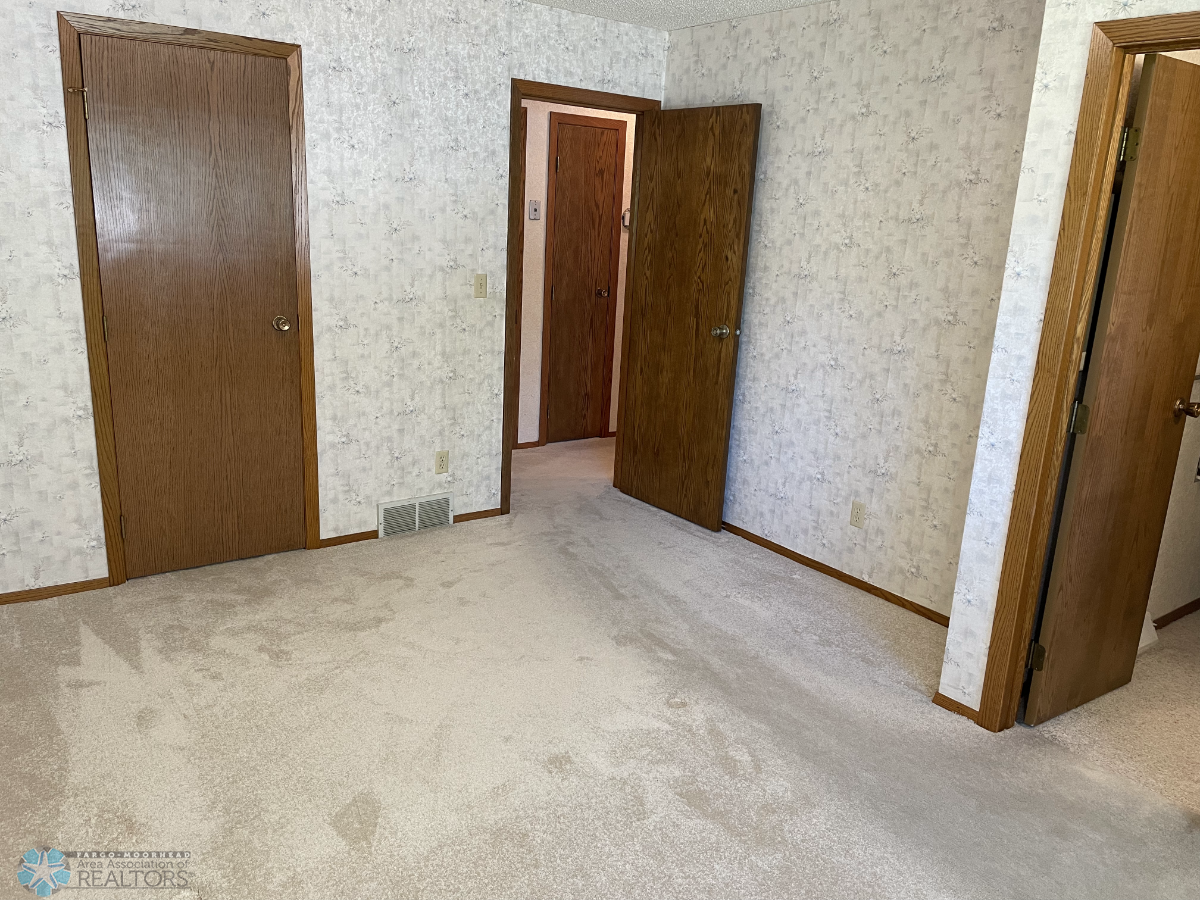Master bedroom view to walk-in closet