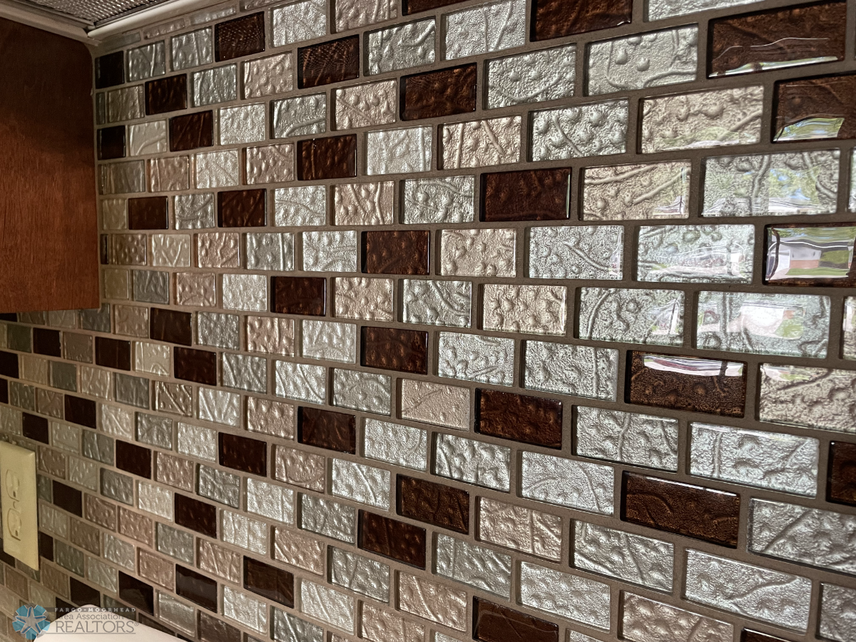 Tile backsplash in kitchen