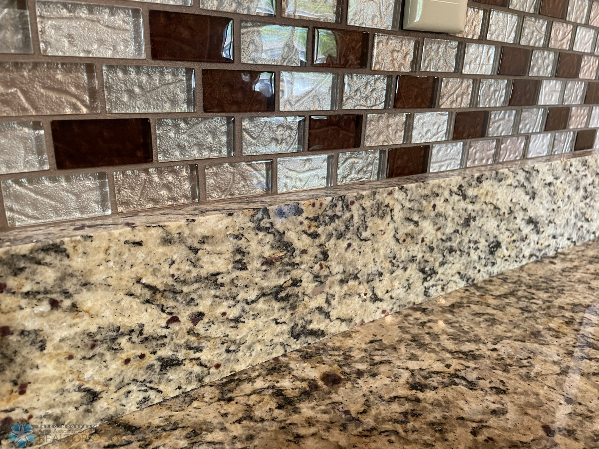 Tile backsplash and granite counters