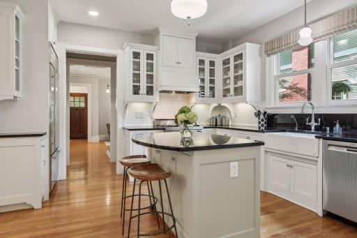 Beautiful view from the kitchen island looking into the expansive dining room space.