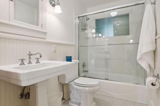 Another full bathroom on the second story! Beautifully updated and with heated tile floors.