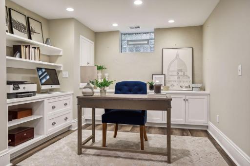 Lower level office space with great built-in storage and details!