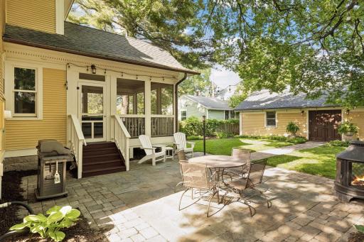Another view of the patio, screen porch and backyard space.
